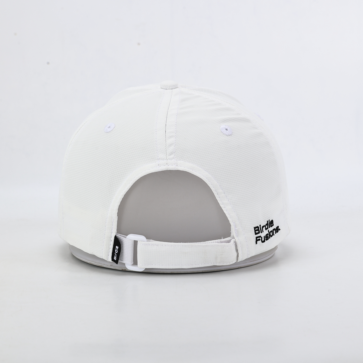 White performance hat with Brown Bear, Back