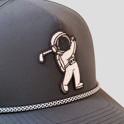 Close-up of the astronaut golfer embroidery on the Black Astronaut Rope Hat